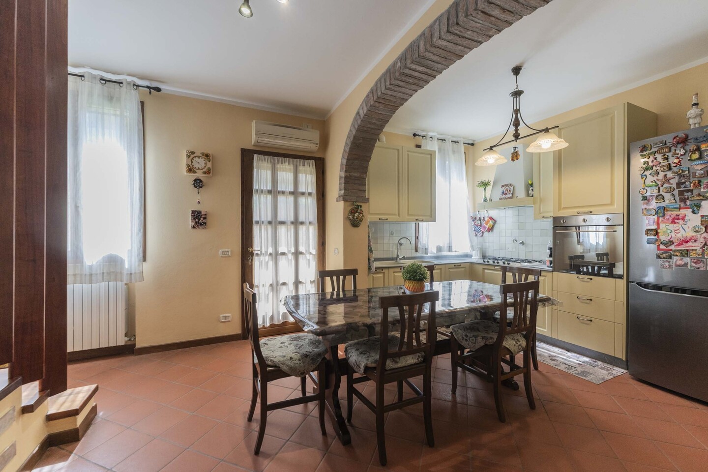 Porzione di casa con giardino e garage a Massumatico